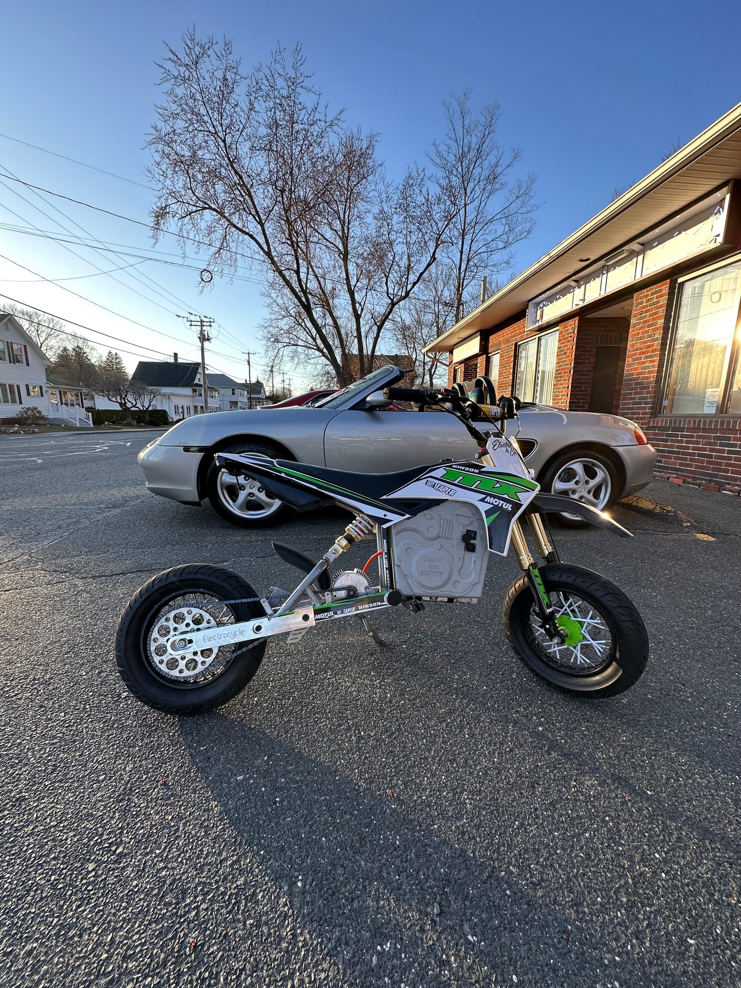 Bolt on extended swingarm