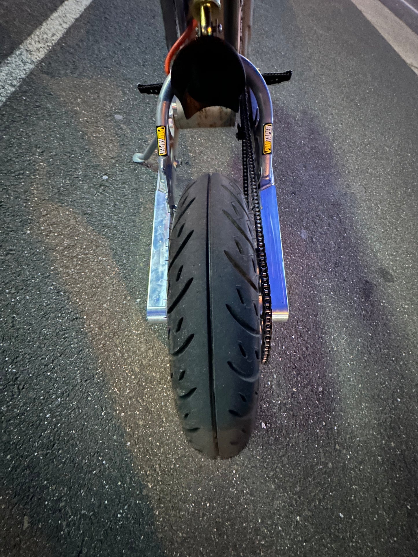 Bolt on extended swingarm