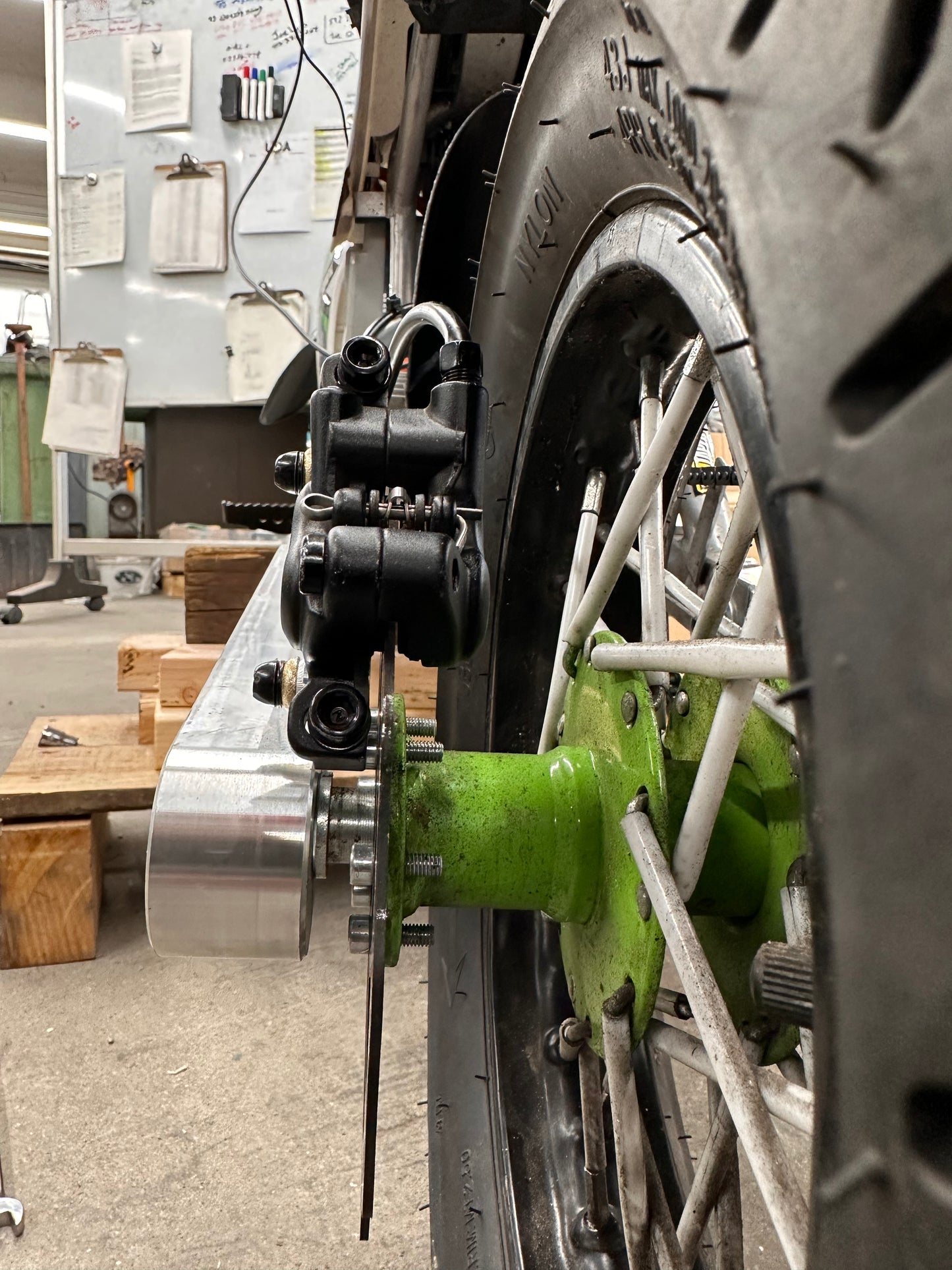 Bolt on extended swingarm