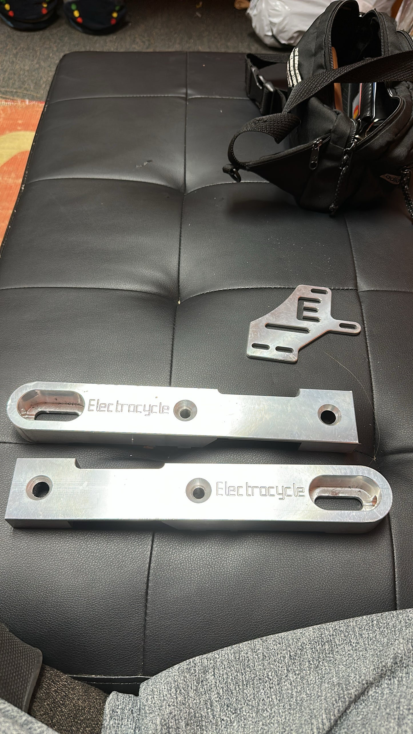 Bolt on extended swingarm